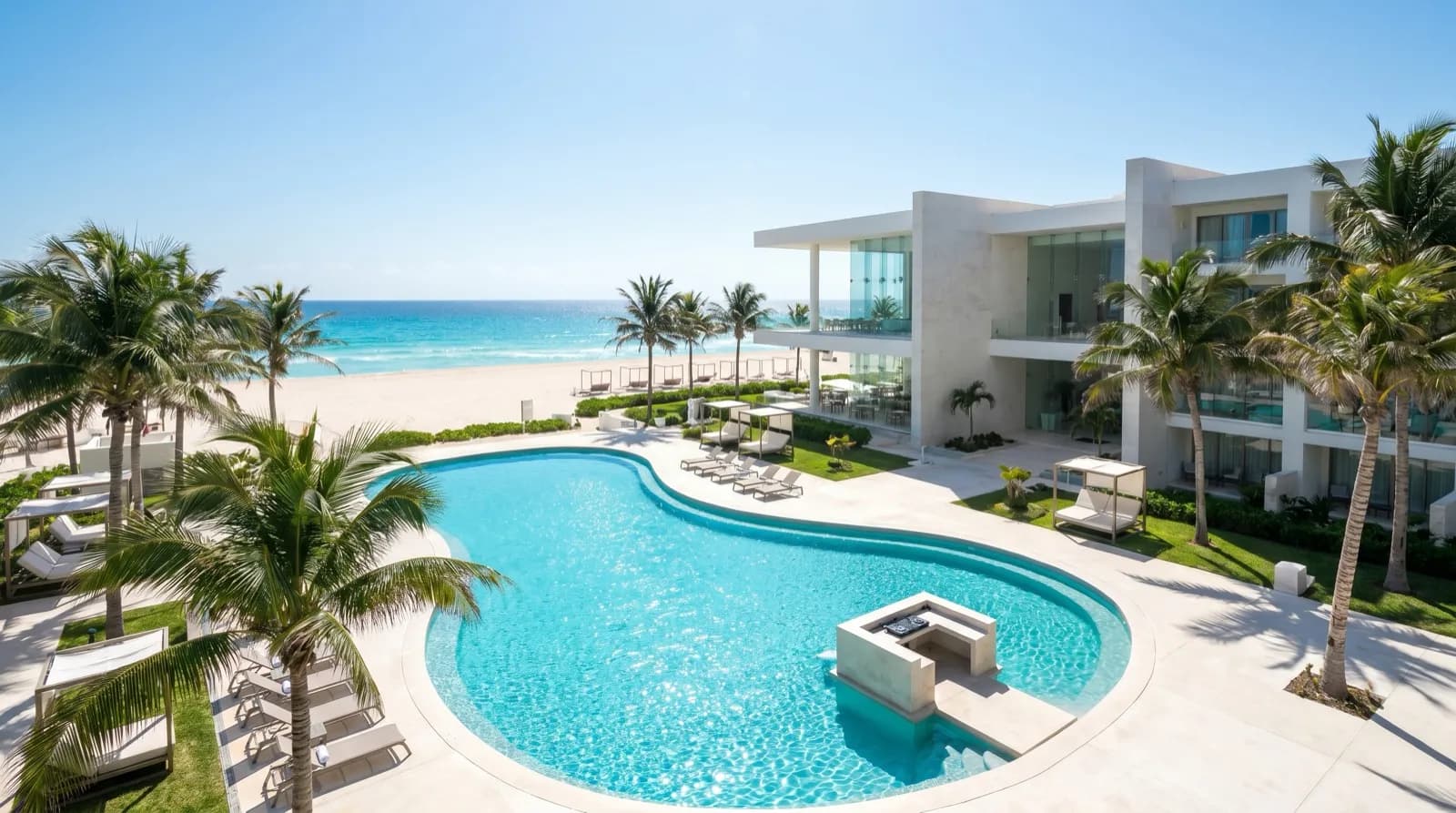 Vibrant adults-only beachfront party resort pool in Cancún